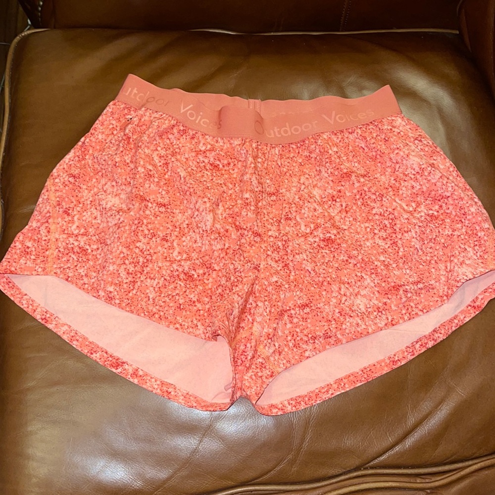 Outdoor Voices orange pebbled relay shorts